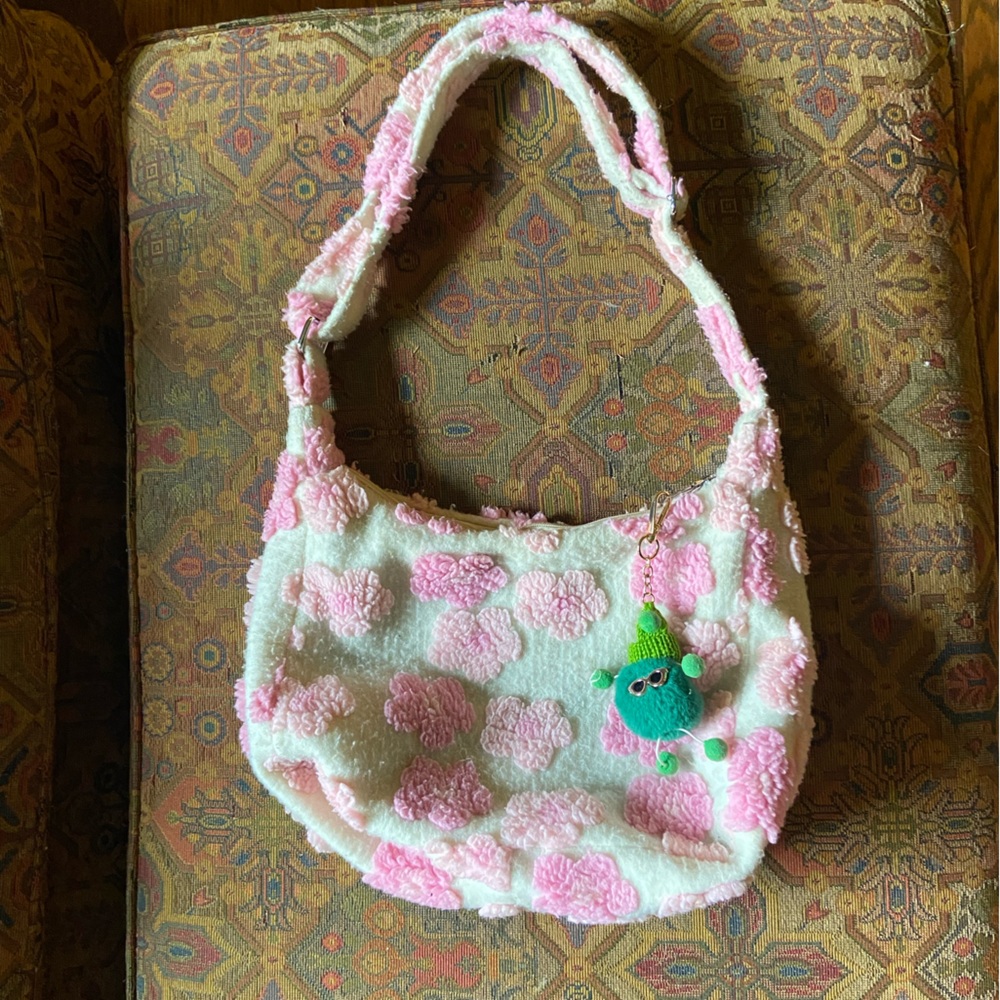 Pink fuzzy messenger bag